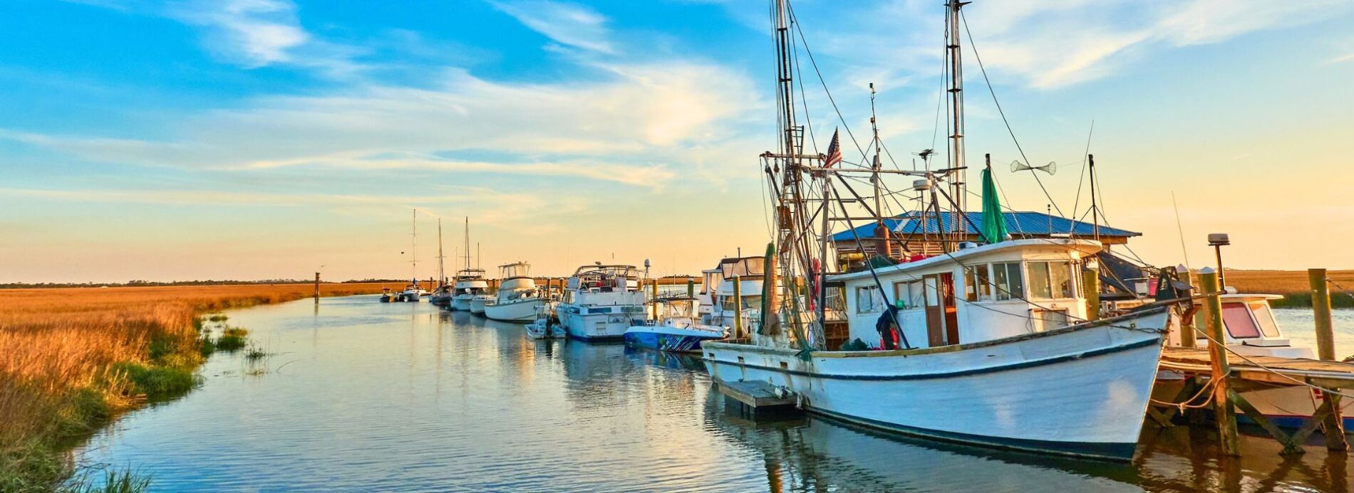 shrimp boats along the water in Atlantic Beach NC