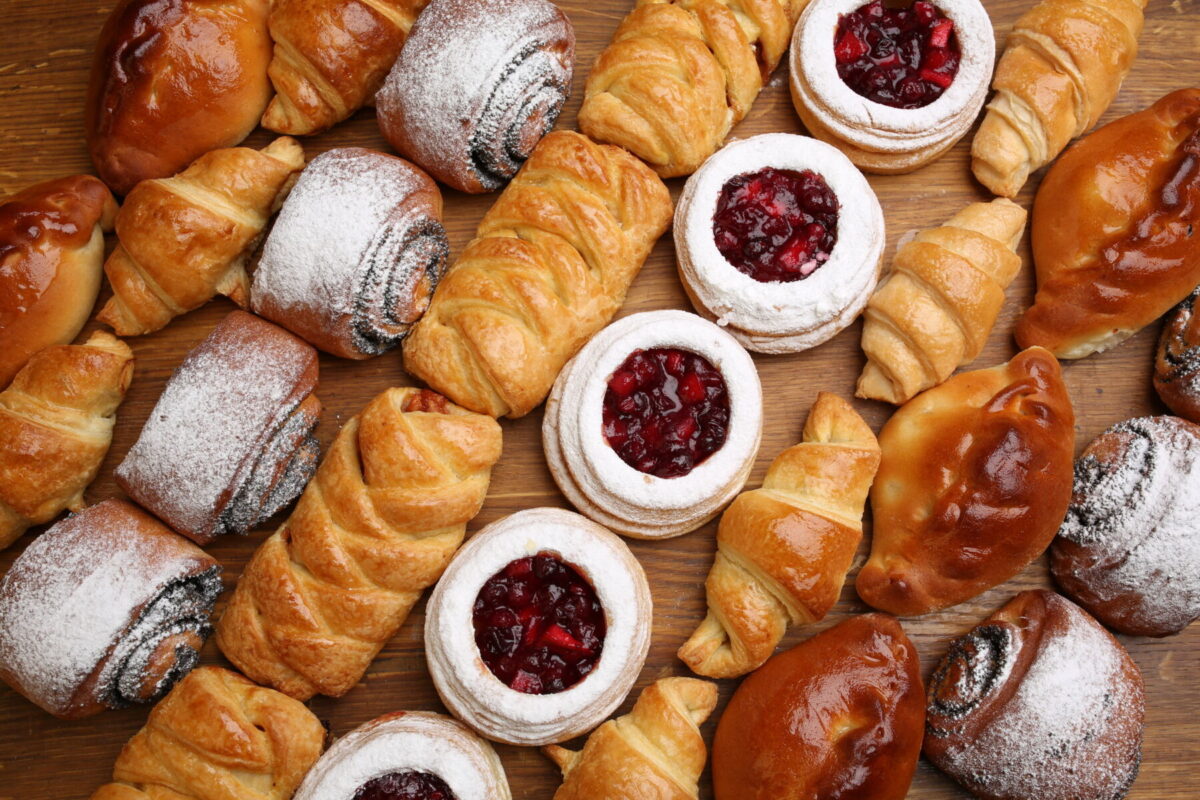 Colorful display of light fluffy pastries arranged diagonally. 