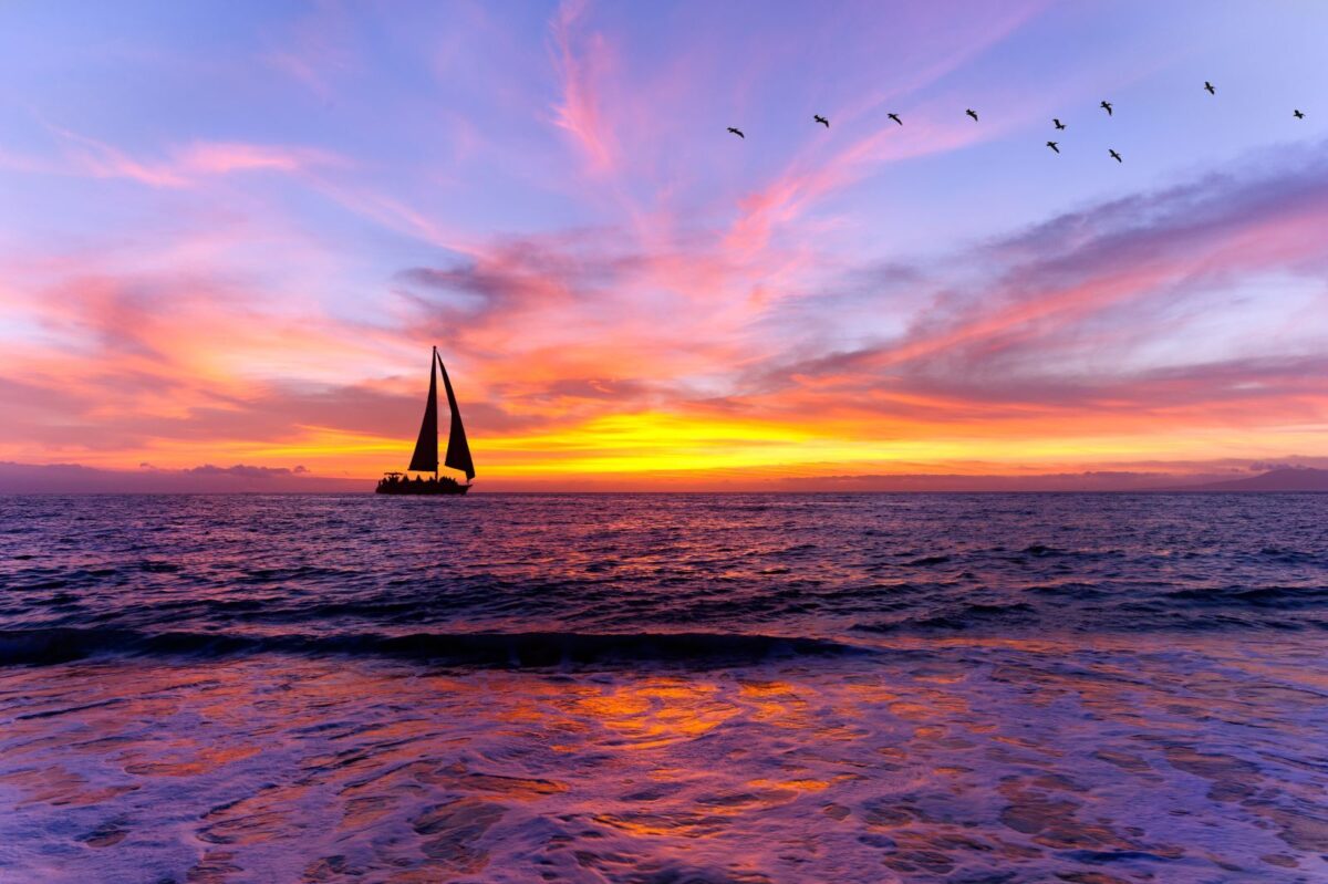 sailboat with sunset